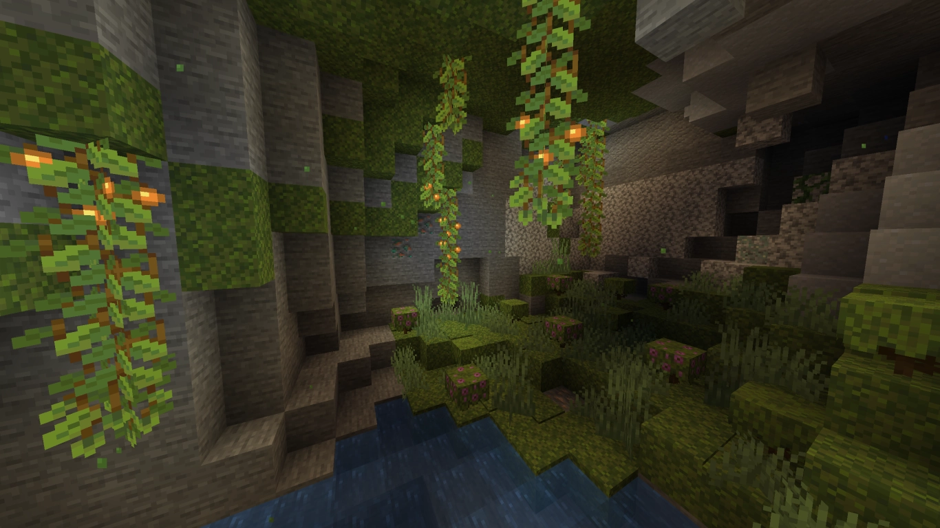 Densely vegetated lush caves with moss and Axolotls in Minecraft