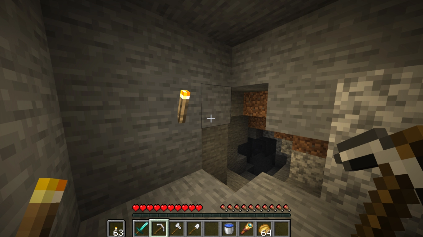 Torches lighting up caves and bases in Minecraft